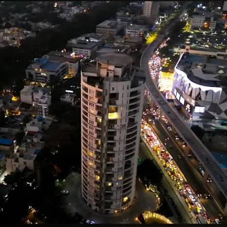 Aerial night view of Bannerghatta Road with city lights and traffic